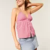 Mini gonna-pantalone in denim a vita bassa con stelle ricamate