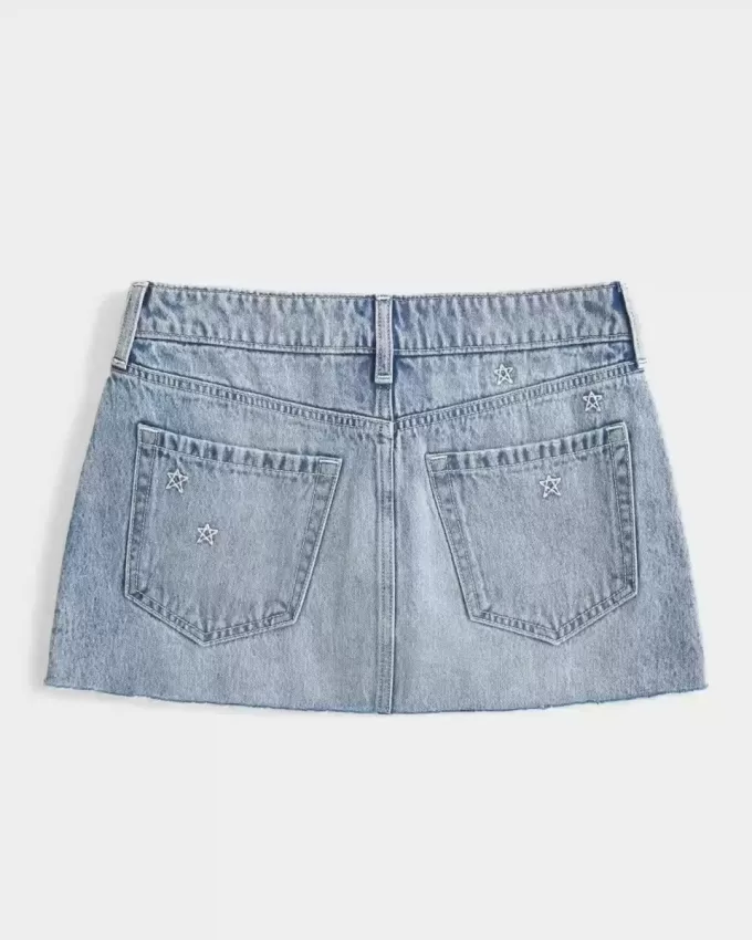 Mini gonna-pantalone in denim a vita bassa con stelle ricamate