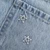 Mini gonna-pantalone in denim a vita bassa con stelle ricamate