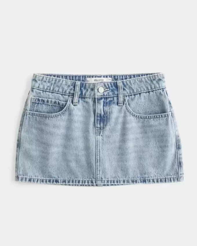 Mini gonna-pantalone in denim a vita bassa e sinuosa