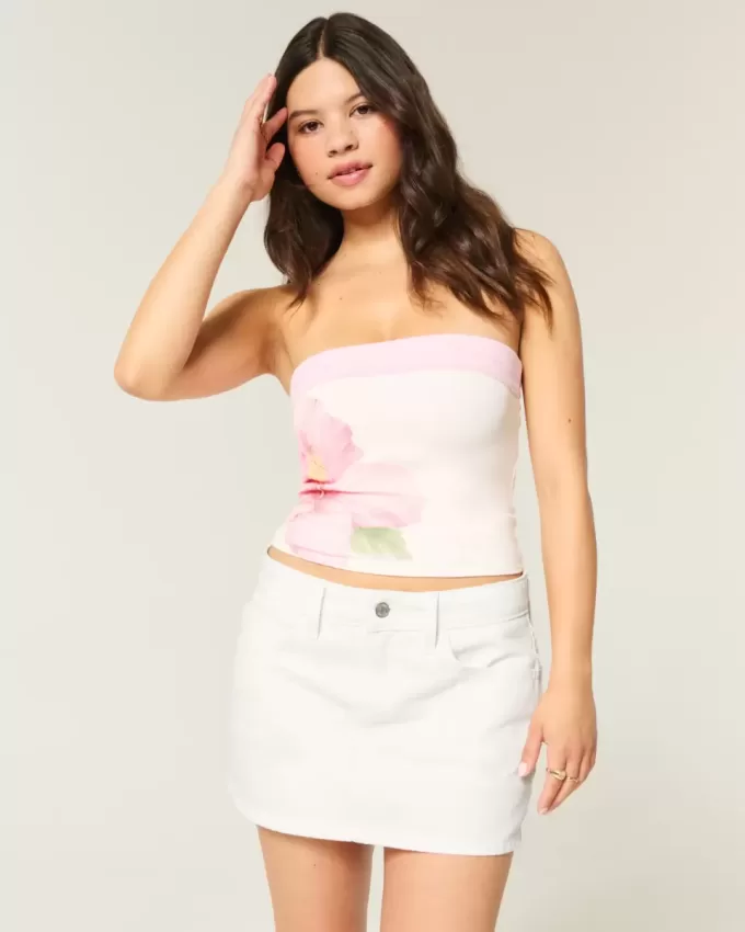 Mini gonna-pantalone in denim bianco a vita bassa