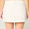 Mini gonna-pantalone in denim bianco a vita bassa