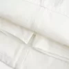 Mini gonna-pantalone in denim bianco a vita bassa