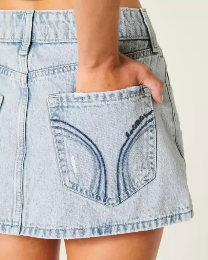 Mini gonna-pantalone in denim chiaro a vita bassa