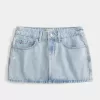 Mini gonna-pantalone in denim chiaro a vita bassa