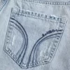 Mini gonna-pantalone in denim chiaro a vita bassa