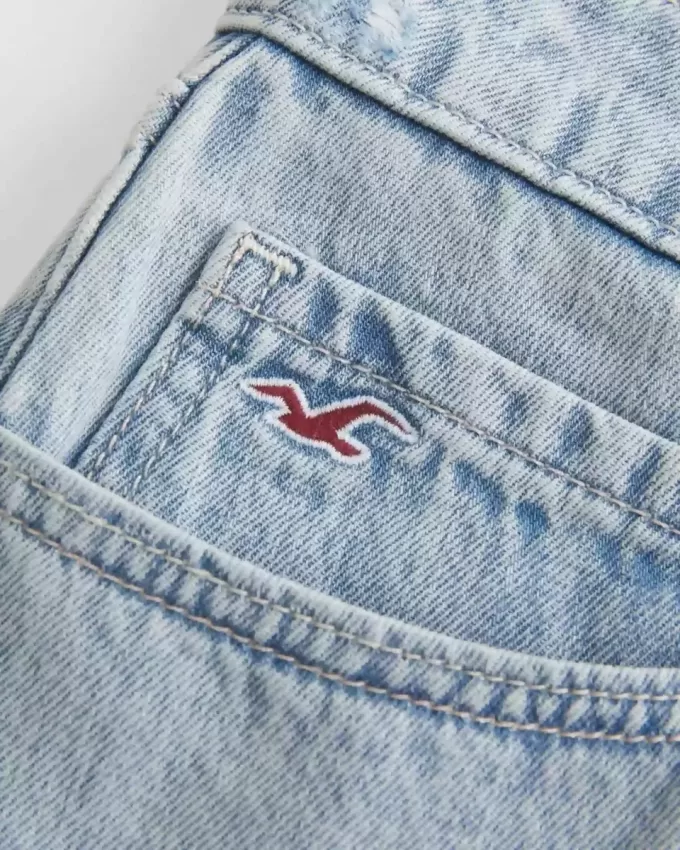 Mini gonna-pantalone in denim chiaro a vita bassa