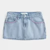 Mini gonna-pantalone in denim chiaro ricamato rosa a vita bassa