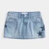 Mini gonna-pantalone in denim con applicazione a stella e lavaggio medio a vita bassa