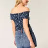 Mini gonna-pantalone in denim con bandiera ricamata e lavaggio medio a vita bassa
