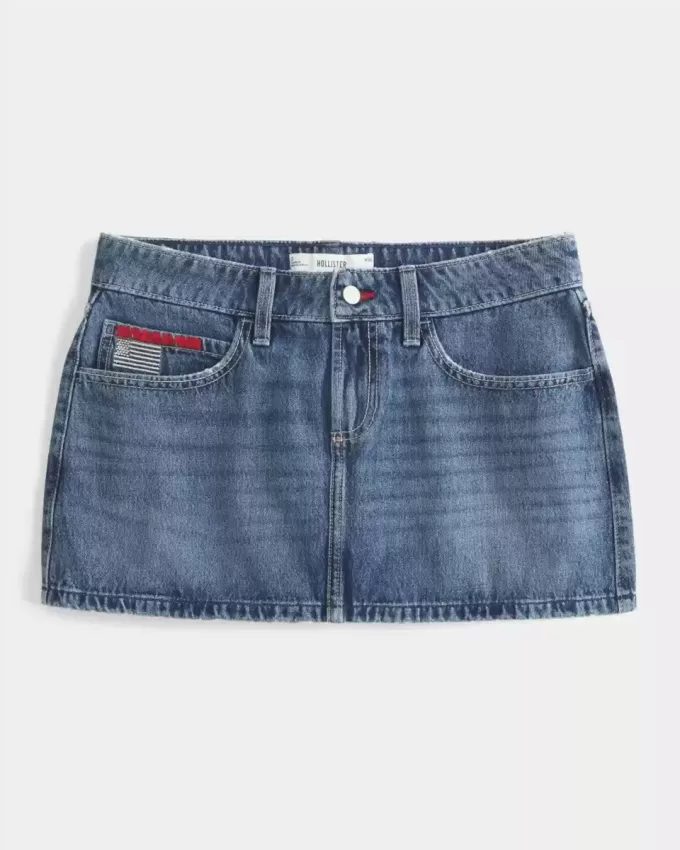Mini gonna-pantalone in denim con bandiera ricamata e lavaggio medio a vita bassa