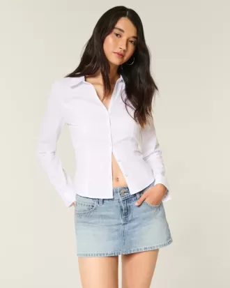 Mini gonna-pantalone in denim con borchie lavaggio chiaro