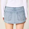 Mini gonna-pantalone in denim con borchie lavaggio chiaro