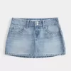 Mini gonna-pantalone in denim con borchie lavaggio chiaro