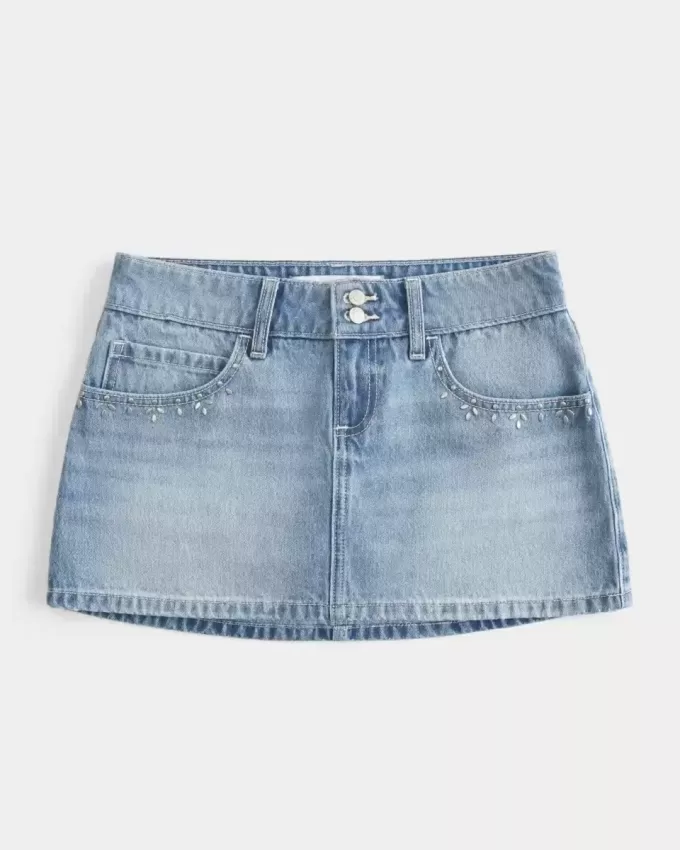 Mini gonna-pantalone in denim con borchie lavaggio chiaro