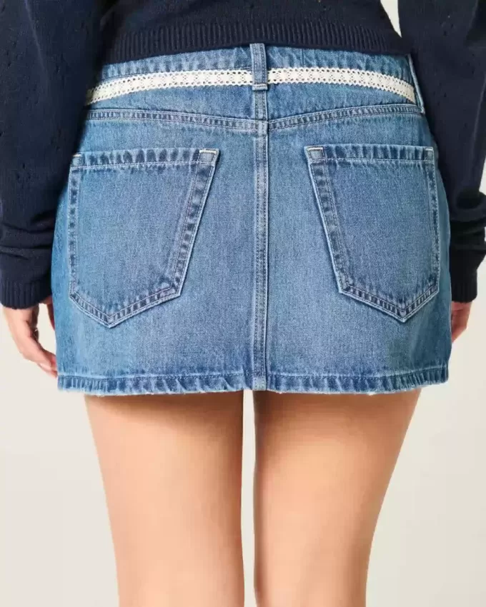 Mini gonna-pantalone in denim con lacci in pizzo