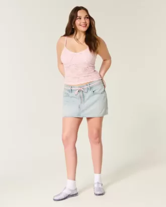 Mini gonna-pantalone in denim con lacci lavaggio chiaro