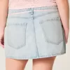 Mini gonna-pantalone in denim con lacci lavaggio chiaro