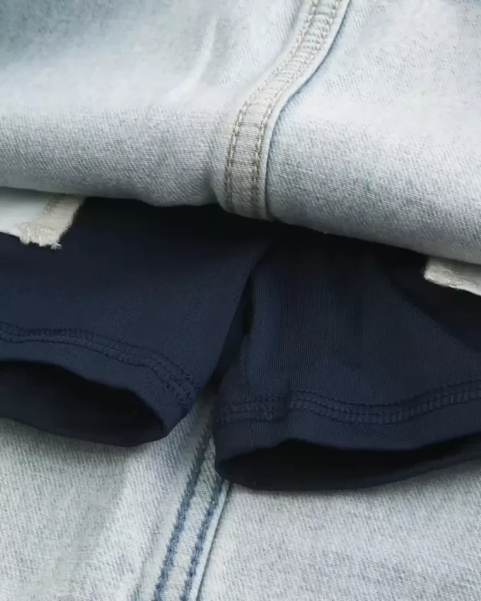 Mini gonna-pantalone in denim con lacci lavaggio chiaro
