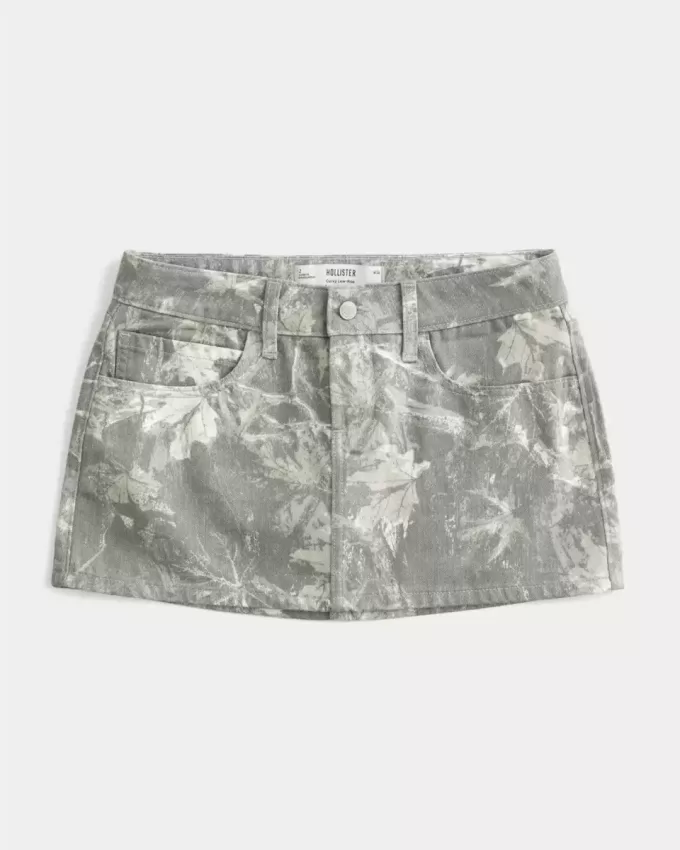 Mini gonna-pantalone in denim mimetico a vita bassa e sinuosa