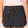 Mini gonna-pantalone in denim nero lavato a vita bassa