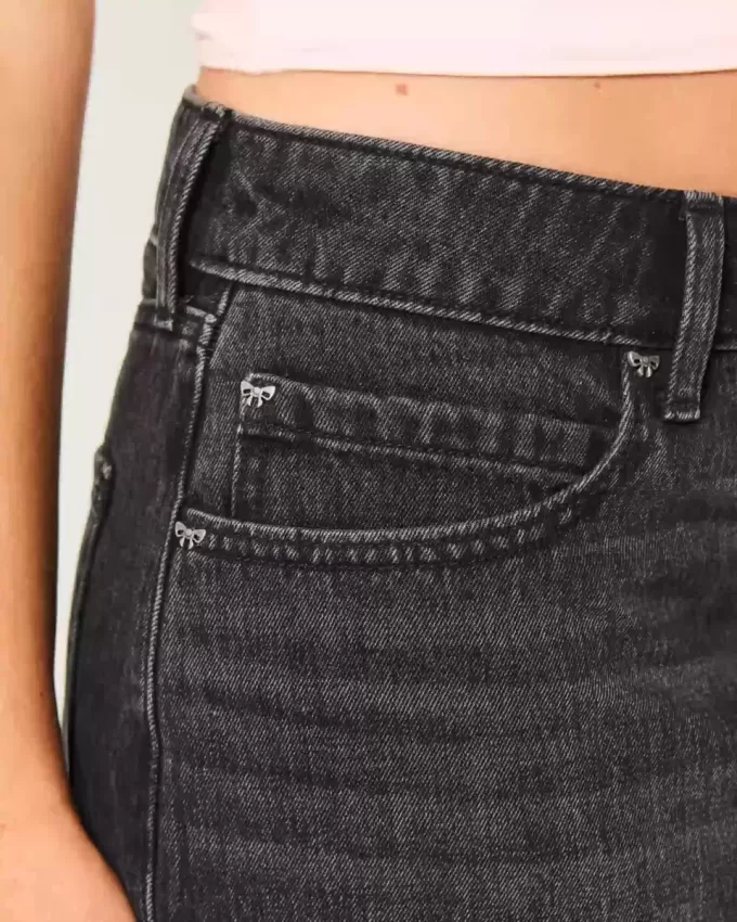 Mini gonna-pantalone in denim nero lavato a vita bassa