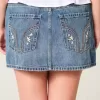 Mini gonna-pantalone in denim ricamato a vita bassa