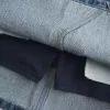 Mini gonna-pantalone in denim ricamato a vita bassa
