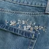 Mini gonna-pantalone in denim ricamato lavaggio medio Mini gonna-pantalone in denim ricamato lavaggio medio