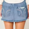 Mini gonna-pantalone in denim scuro strappato a vita bassa Mini gonna-pantalone in denim scuro strappato a vita bassa
