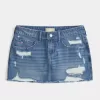 Mini gonna-pantalone in denim scuro strappato a vita bassa Mini gonna-pantalone in denim scuro strappato a vita bassa