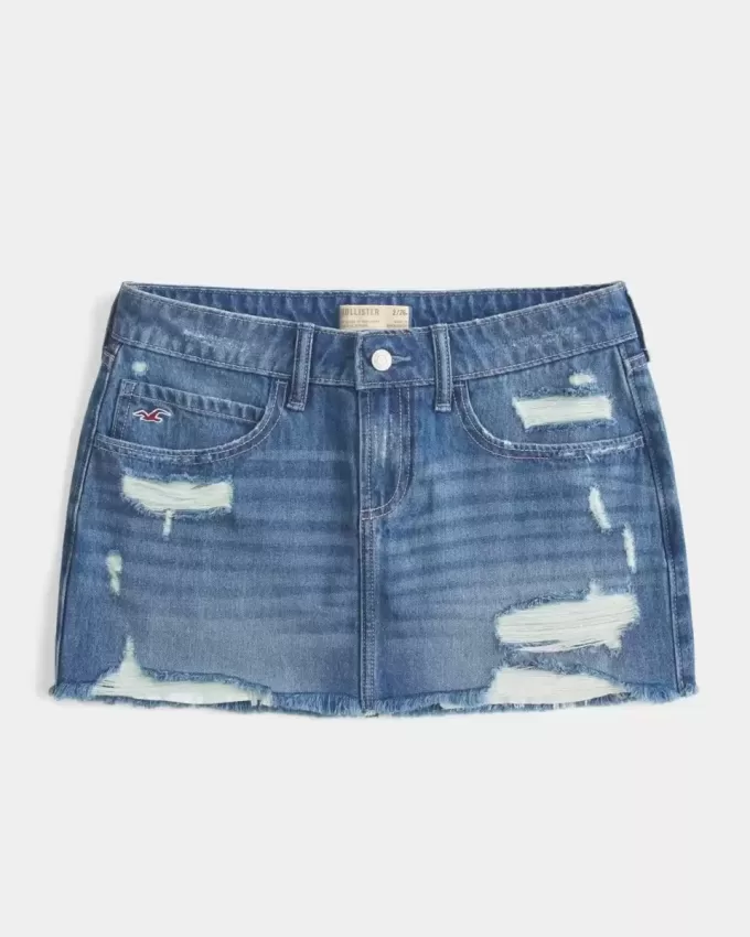 Mini gonna-pantalone in denim scuro strappato a vita bassa Mini gonna-pantalone in denim scuro strappato a vita bassa