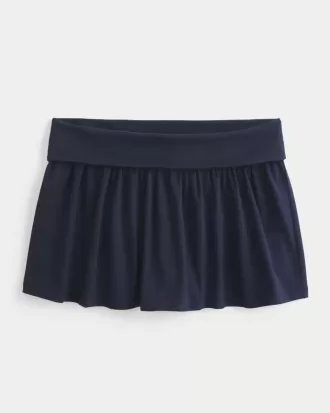 Mini gonna-pantalone in maglia con risvolto