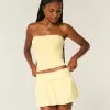 Mini gonna-pantalone in maglia con risvolto
