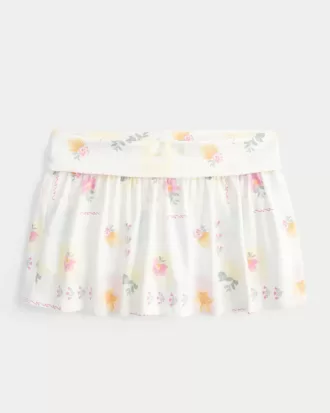 Mini gonna-pantalone in maglia con risvolto