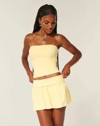Mini gonna-pantalone in maglia con risvolto