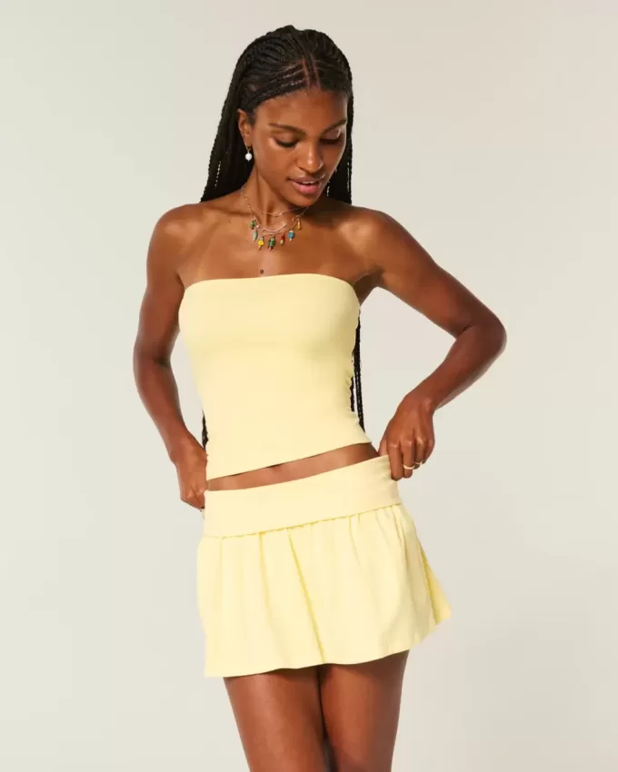 Mini gonna-pantalone in maglia con risvolto