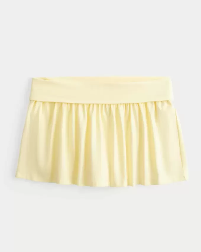 Mini gonna-pantalone in maglia con risvolto
