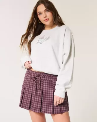Mini gonna-pantalone plissettata a vita media