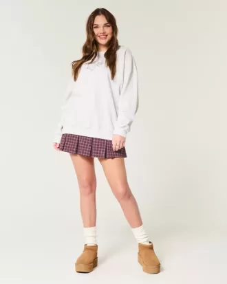 Mini gonna-pantalone plissettata a vita media