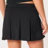 Mini gonna-pantalone plissettata a vita media
