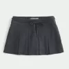 Mini gonna-pantalone plissettata a vita media