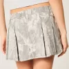 Mini gonna-pantalone plissettata mimetica Mini gonna-pantalone plissettata mimetica