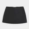 Mini gonna-skirt a vita alta a trapezio