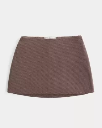 Mini gonna-skirt a vita alta a trapezio