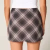 Mini gonna-skirt a vita alta a trapezio