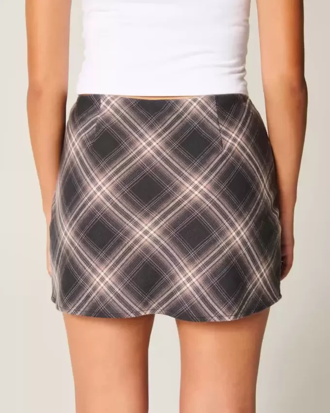 Mini gonna-skirt a vita alta a trapezio