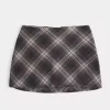 Mini gonna-skirt a vita alta a trapezio