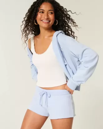 Mini pantaloncini in pile con grafica in pizzo