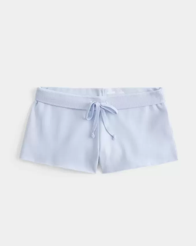 Mini pantaloncini in pile con grafica in pizzo Mini pantaloncini in pile con grafica in pizzo